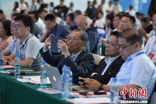 研討會現(xiàn)場圖?！■暮陚?攝