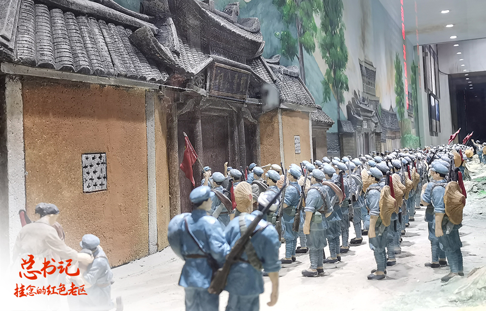這是在福建省長(zhǎng)汀縣中復(fù)村拍攝的紅軍長(zhǎng)征出發(fā)動(dòng)員會(huì)微型雕塑（2021年4月27日攝）。